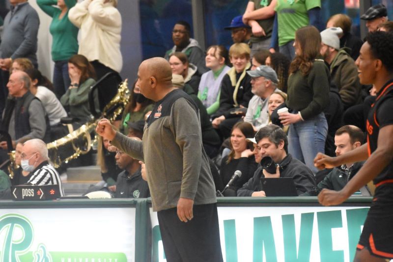 Coach Bates after CCAC playoff bid clinching win at Roosevelt last season to end the regular season.