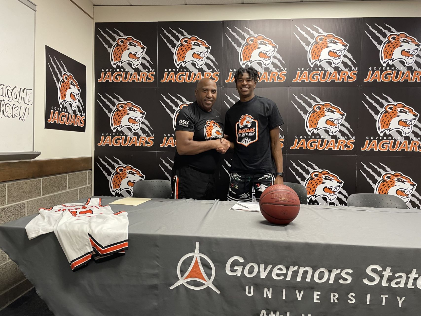 GSU Head Coach Tony Bates with new Jaguar signee Oluyemi Elutilo, - "Yemi".
