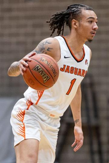 (1) Trae Warren scored 16 points at St. Xavier Saturday with four players scoring in double figures, 81-67 win.