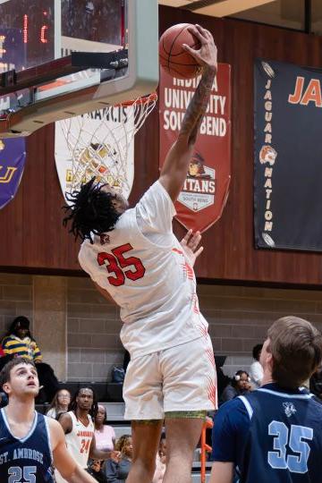 (35) Vincent Mayes had 17 points, 4 rebounds, 5 assists and 5 blocked shots in OT win vs. Trinity Christian.