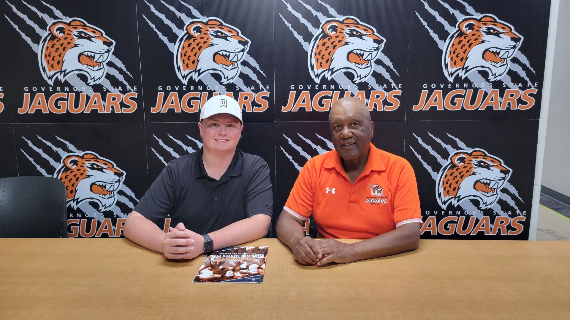 Austin Bjes with GSU Head Golf Coach Fred Hawkins.