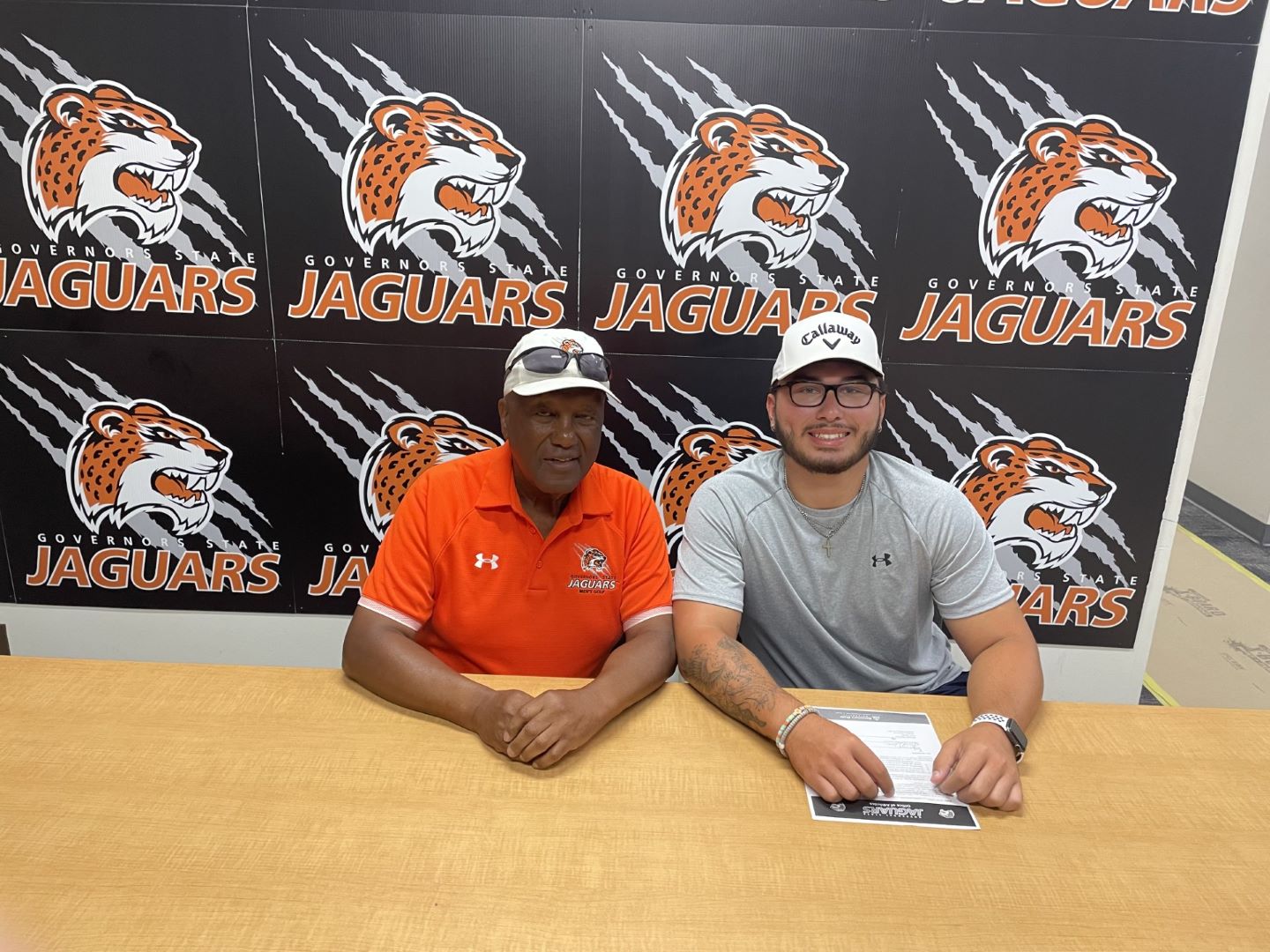 GSU Men's Golf Coach Fred Hawkins (L) and new Jaguar golf signee Isaac Mackan on signing day.