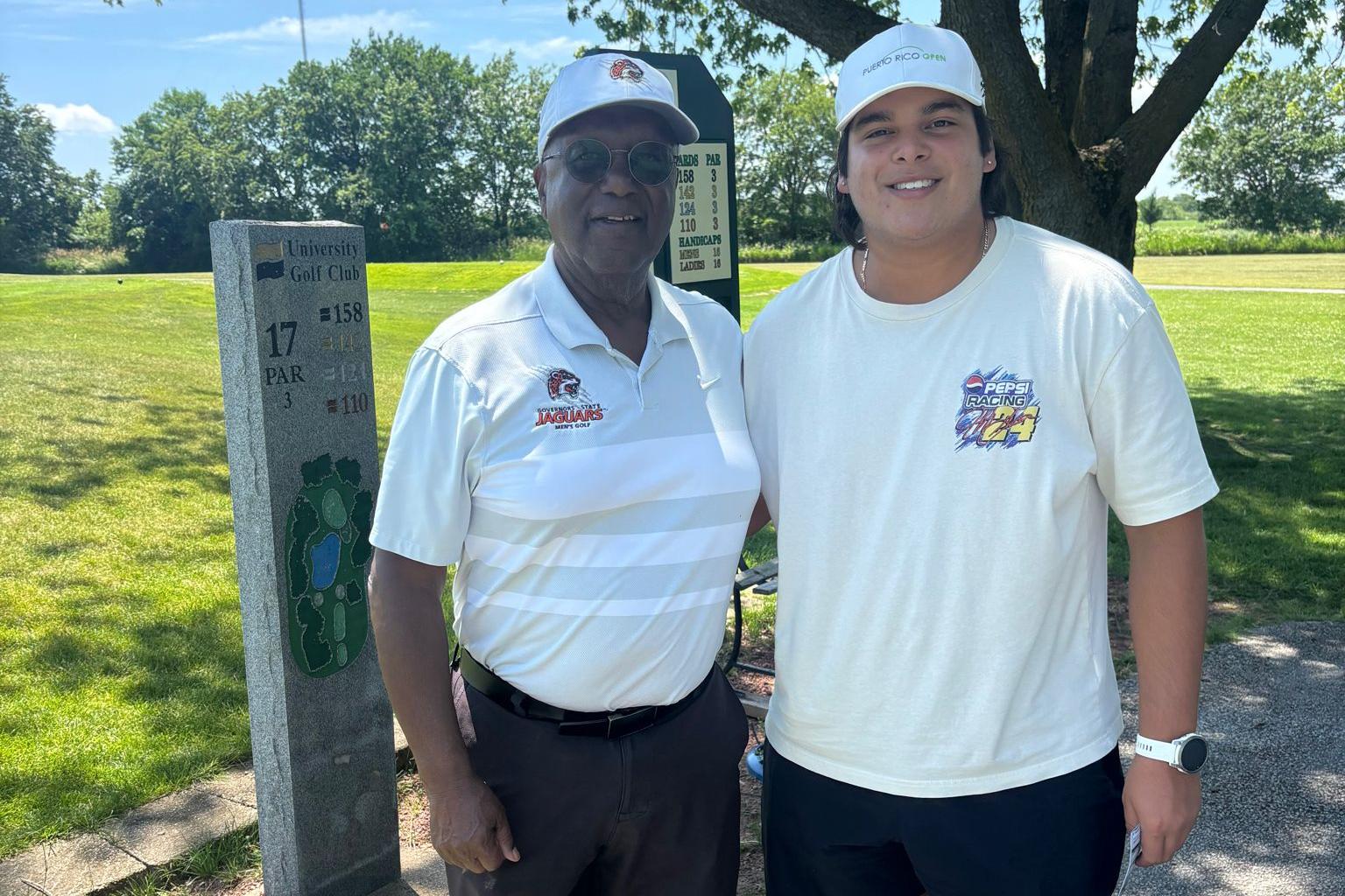 GovState Head Golf Coach Fred Hawkins and All-CCAC 2026 Conference golfer Julio Roman (right).