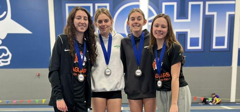 GSU's first place CCAC women's indoor track championship meet 4 X 800 relay team,  L-R - Krysta Stanko, Trinity Bonham, Sydney Bonham, Kaylee O'Sullivan - podium shot in Iowa at St. Ambrose University.