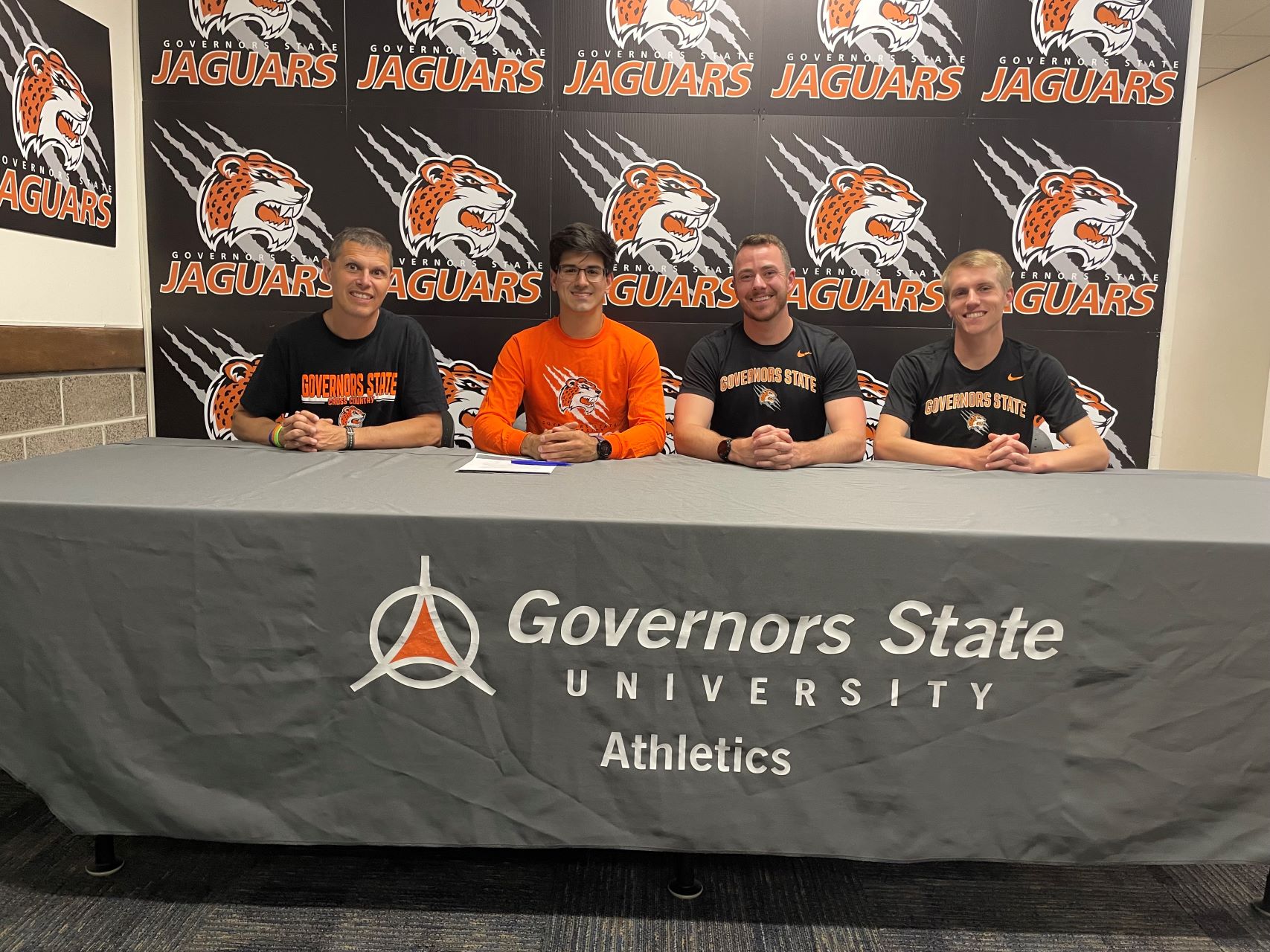 (L-R)Assistant Coach Dave Ladehoff, Randy Almarales, GSU Head Cross Country, Track Coach John Niendorf, Assistant Coach Lenny Baumann.