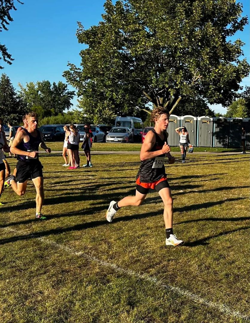 GSU bib#1325 Freshman Granison Hill running at the Sept. 1, St. Francis Twilight Meet, Channahon Park, IL.