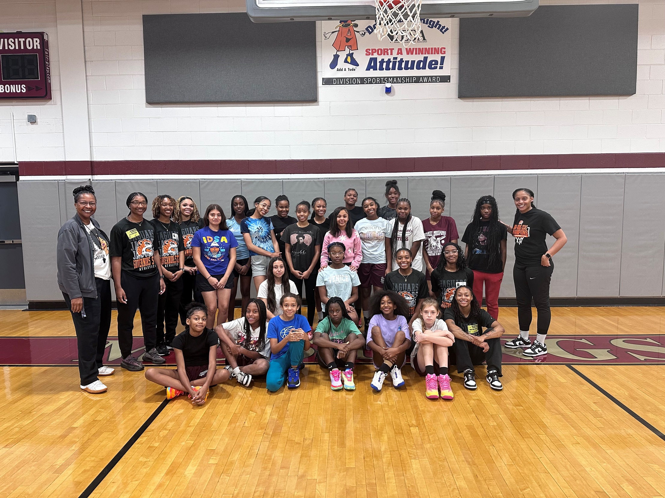 GovState women's basketball team with the 7th and 8th grade girls' basketball teams at Memorial Junior High in Lansing, IL, October 7, 2025.