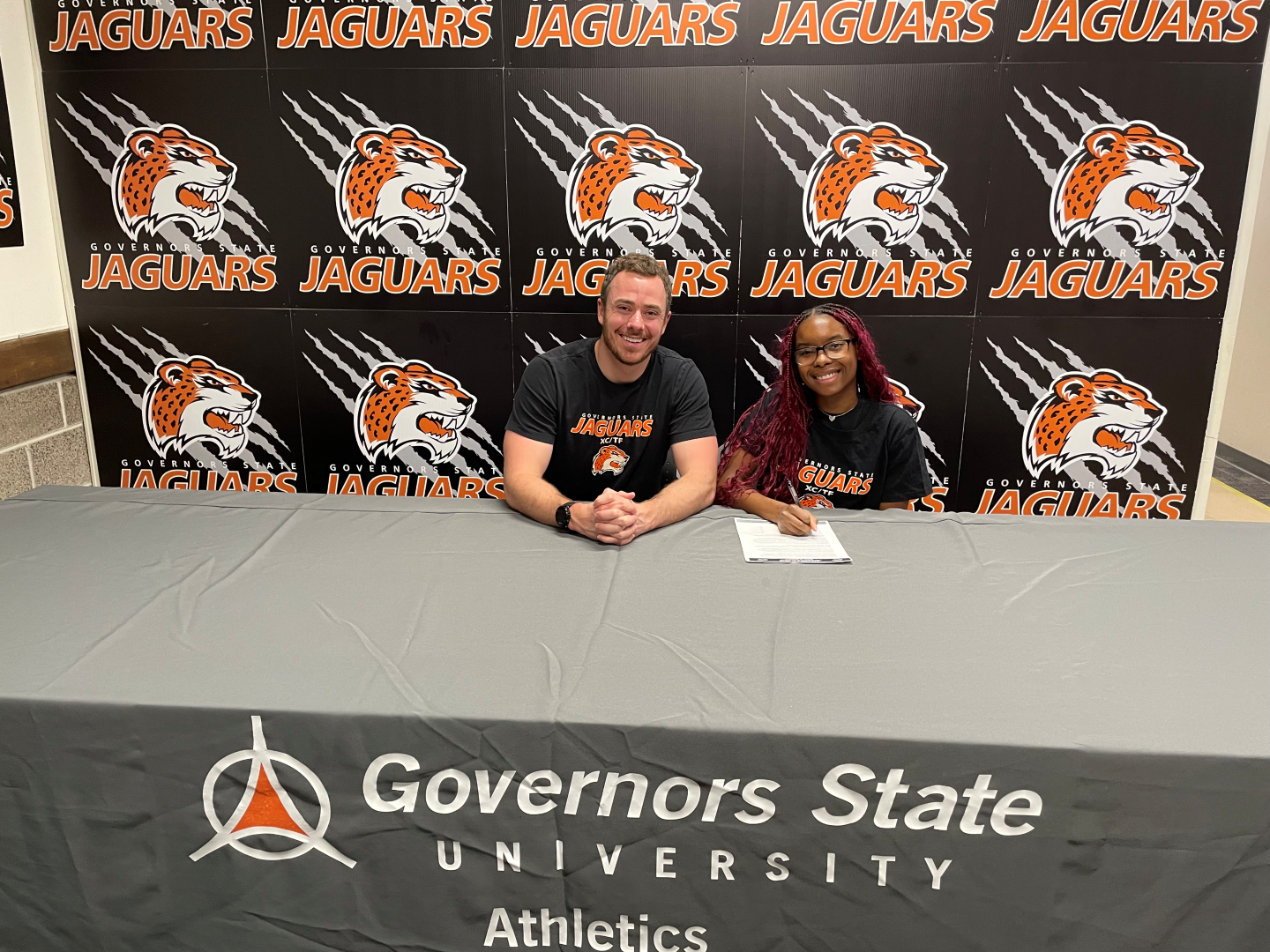 GSU Head Coach John Niendorf and Jada Cunningham on signing day at Governors State University.